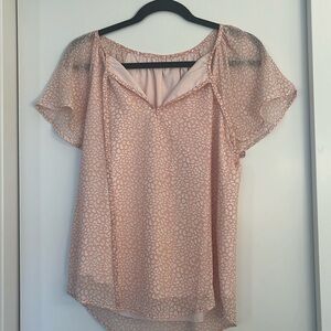 Pink cheetah print top in a size small
